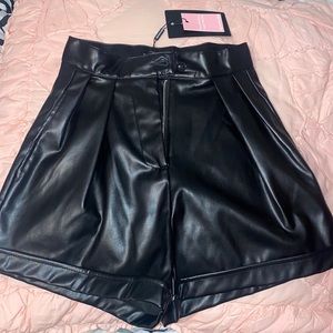 Faux leather shorts.